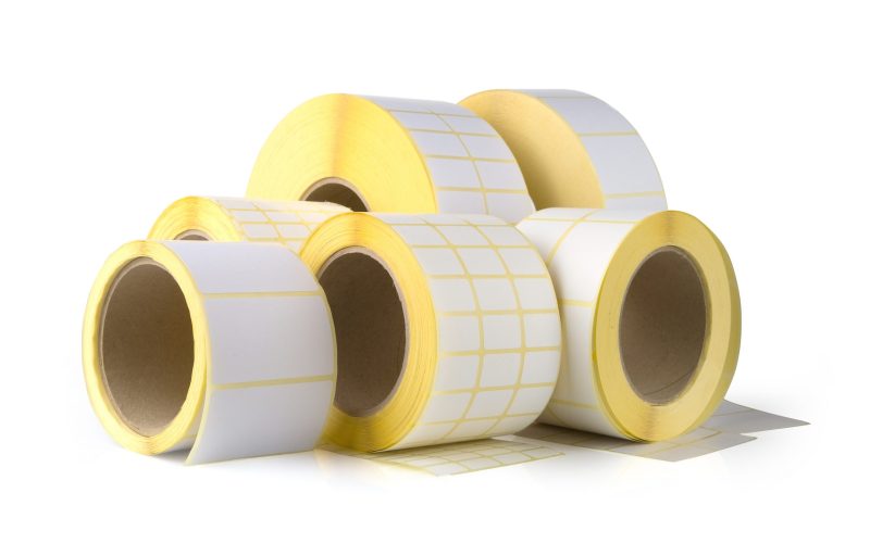 Sticky,Label,Rolls,On,White,Background.